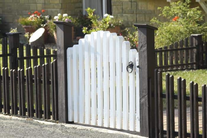 setting chain link fence posts on a slope